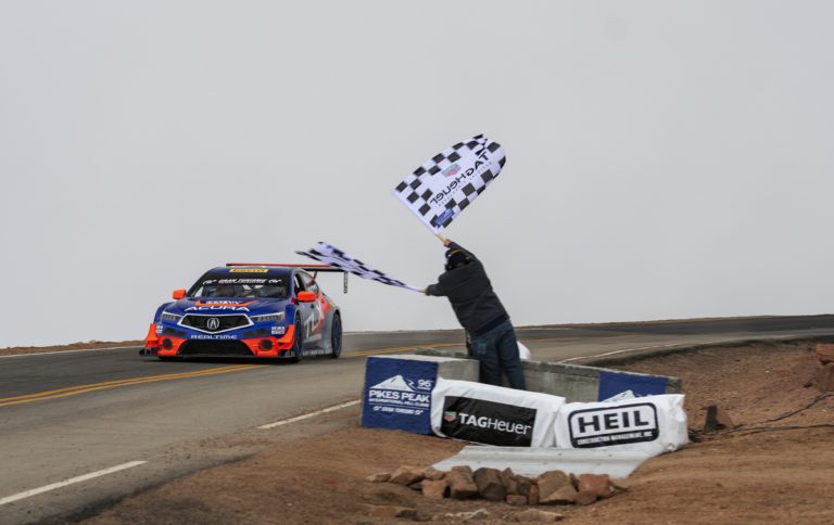 Peter Cunningham in the Realtime Racing TLX GT wins Open Class, finishes third overall and is the fastest production-based car up Pikes Peak in 2018.